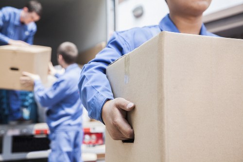 Removal van and moving boxes for a Putney home move