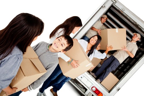 Local man and van moving boxes in Putney