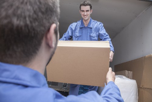 House removal team planning a move in Putney residential street