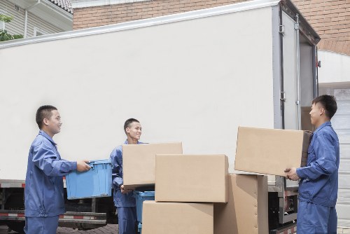 Packed boxes and furniture ready for a Putney home move