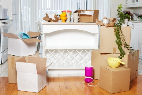 Packed boxes and furniture ready for local removals in Putney