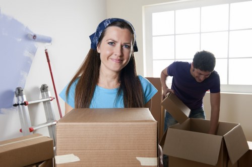 Business relocation preparation with boxes and furniture in Putney