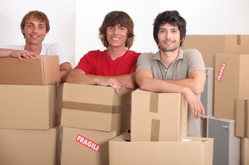 Loading household items into a removals van in Putney