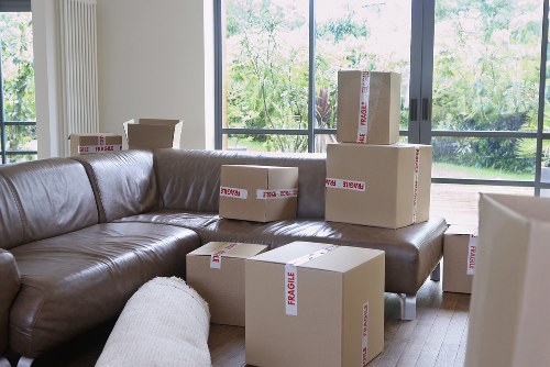 Packed boxes and home moving preparation in a Putney property