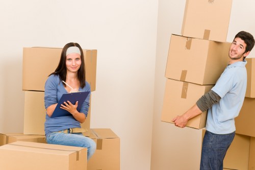 Prepared moving boxes in a Putney flat before collection