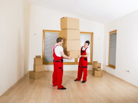 Office furniture pick-up service in Putney with desks and chairs ready for removal
